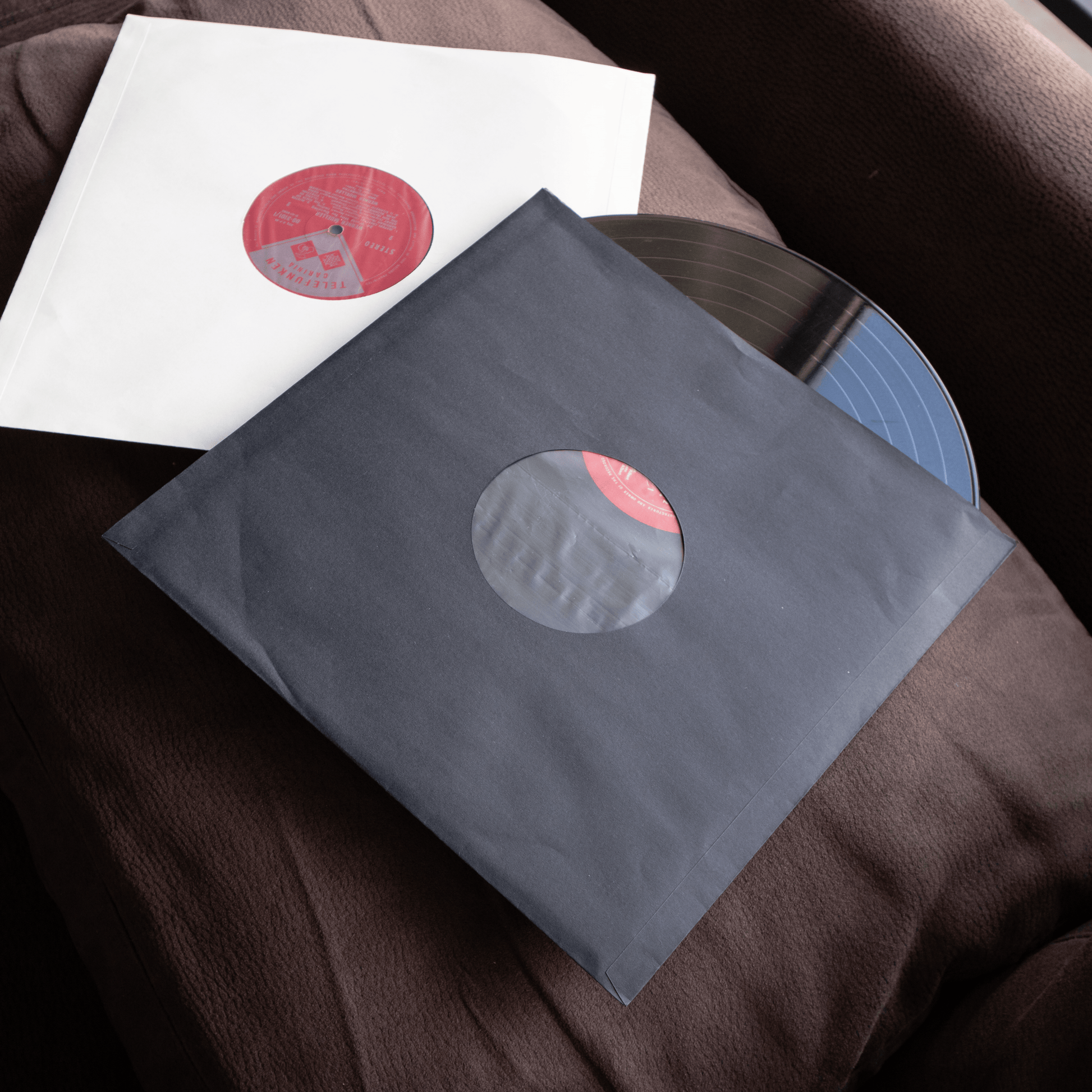 12" Vinyl Record Inner Sleeves Poly Lined Kraft Paper Pack of 25 – lifestyle in use, vinyl record storage