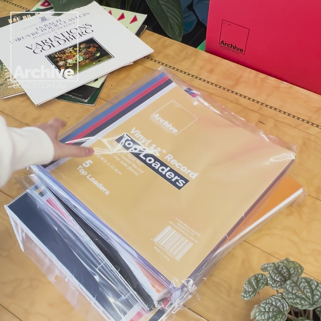 Load video: 12-inch vinyl record toploaders for protecting LP covers and sleeves — made from crystal-clear, archival-safe polypropylene.