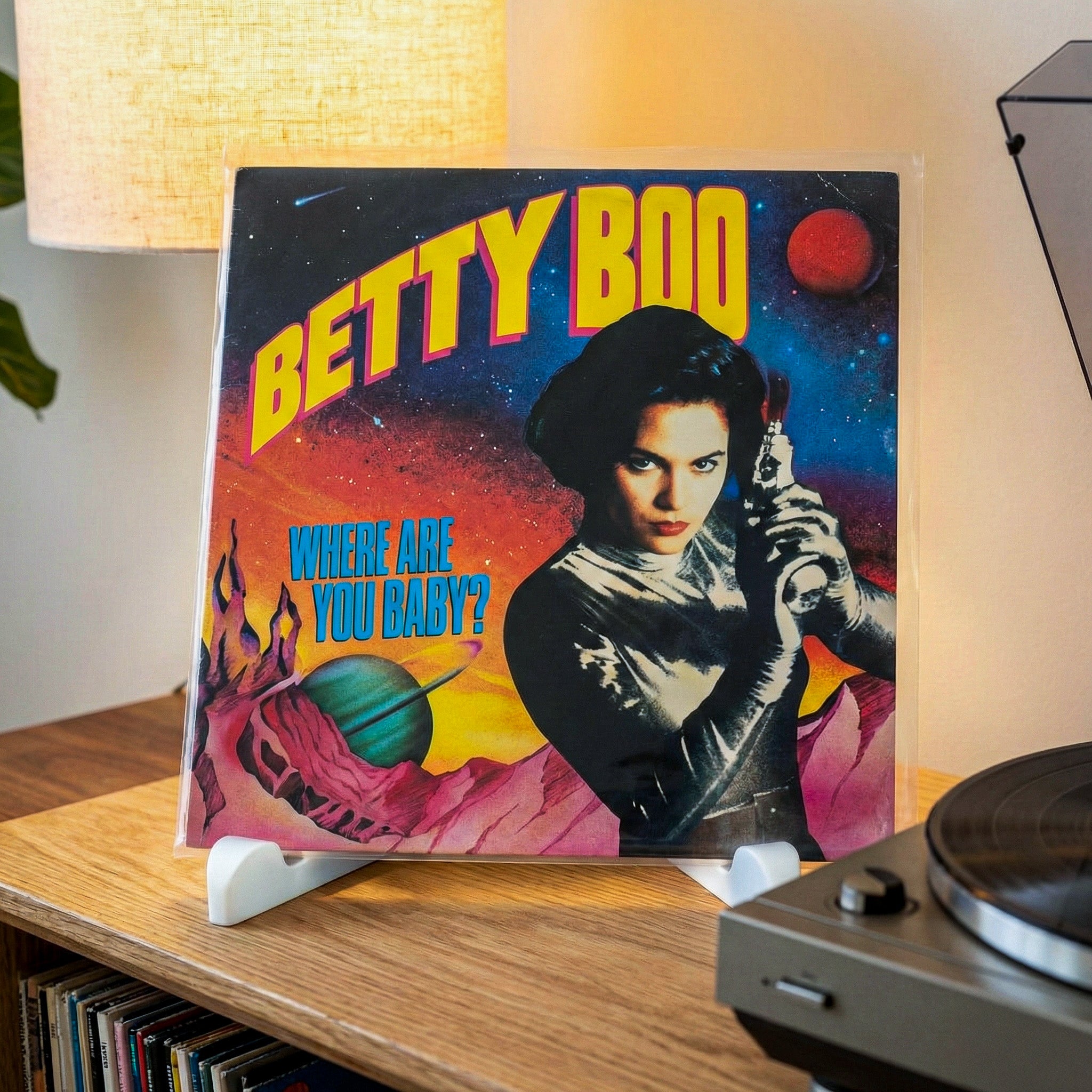 Adjustable vinyl record display stand for LP artwork